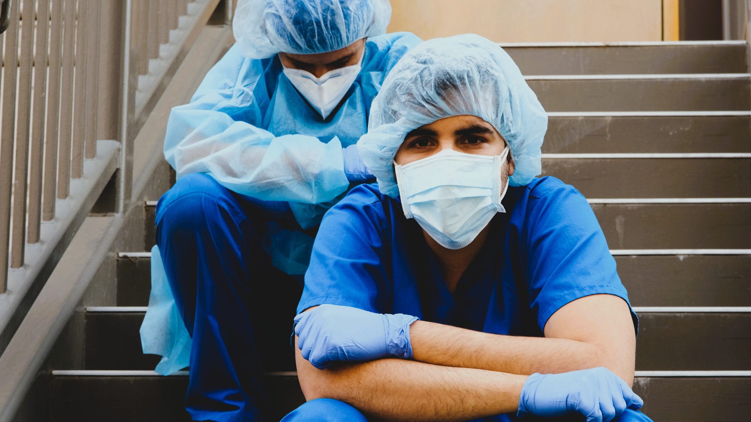 Healthcare workers supporting one another